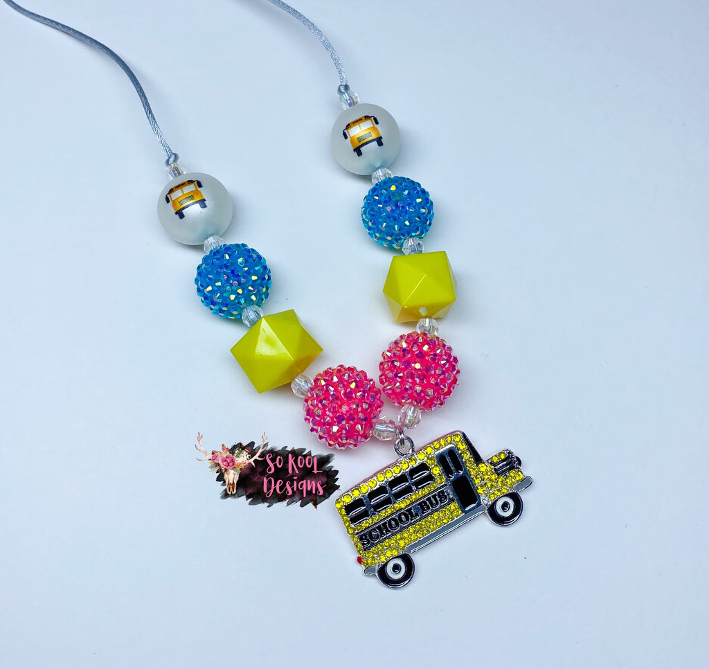 Sparkly rhinestone bus pendant with matching beads