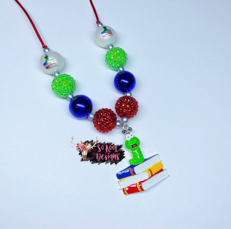 Cute worm on a stack of books pendant with matching beads