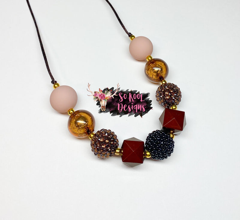 Black berry, brown rhinestone, & nude matte beads